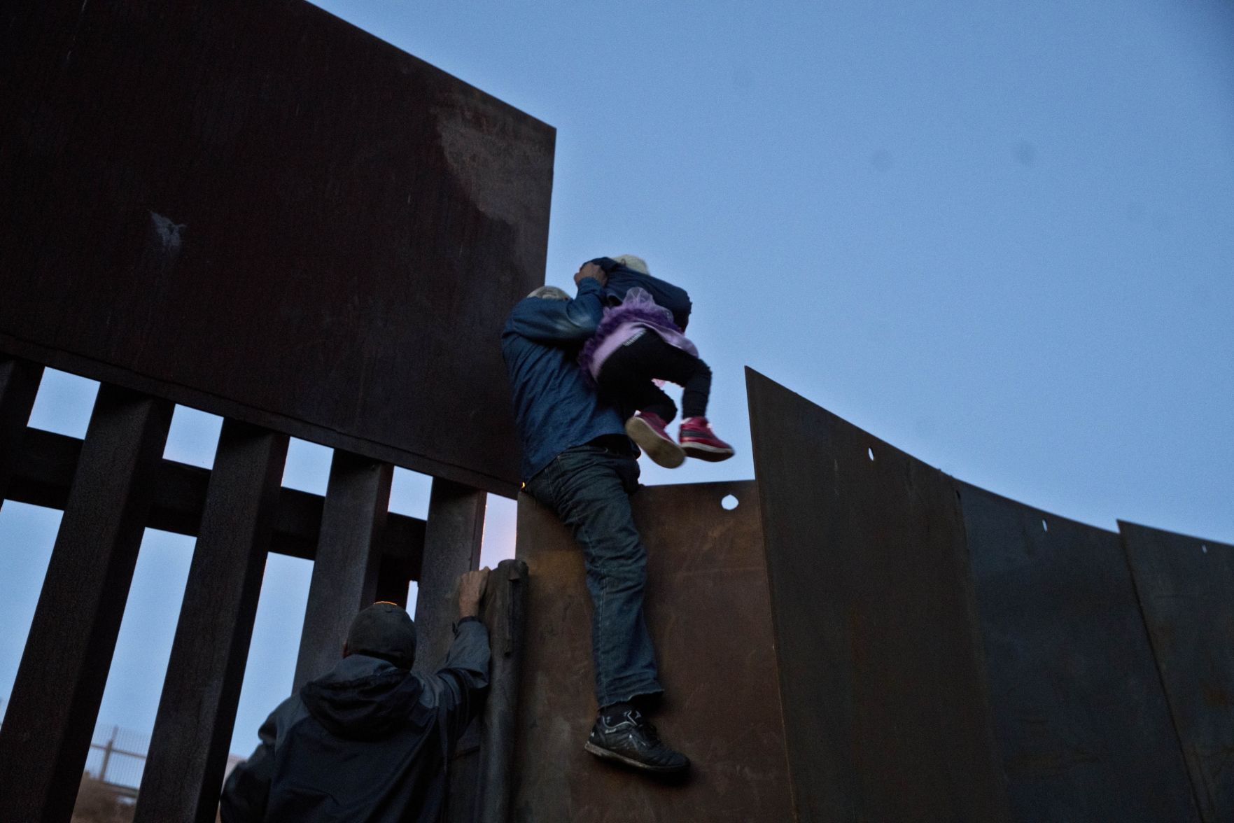 Central America Migrant Caravan - Jumping the Wall Photo Gallery